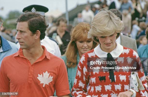 Diana, Princess of Wales , Prince Charles and Sarah Ferguson attend a polo match at Smith's Lawn, Guards Polo Club, Windsor, June 1983. Diana is...