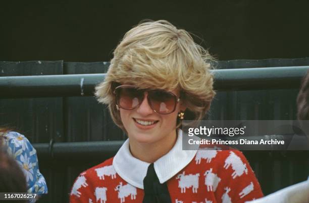 Diana, Princess of Wales attends a polo match at Smith's Lawn, Guards Polo Club, Windsor, June 1983. She is wearing a Muir and Osborne 'black sheep'...