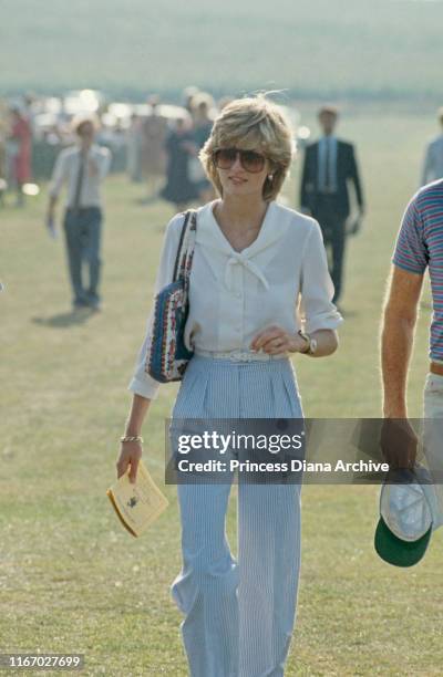 Diana, Princess of Wales attends a polo match at Cowdray Park Polo Club in West Sussex on her second wedding anniversary, 29th July 1983.