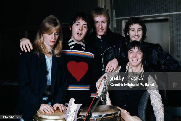 British rock group Wings pictured together at Abbey Road Studios to record the album, 'Venus And Mars', London, 15th November 1974. Left to right:...