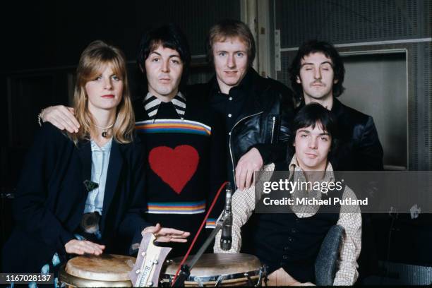 British rock group Wings pictured together at Abbey Road Studios to record the album, 'Venus And Mars', London, 15th November 1974. Left to right:...