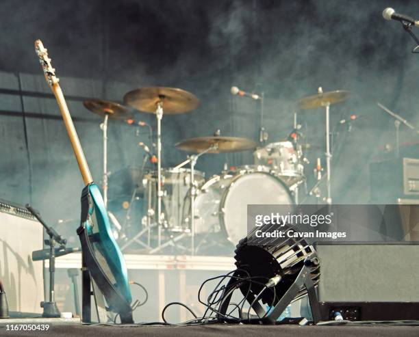 concert stage with instruments and smoke. - guitar stage stock pictures, royalty-free photos & images