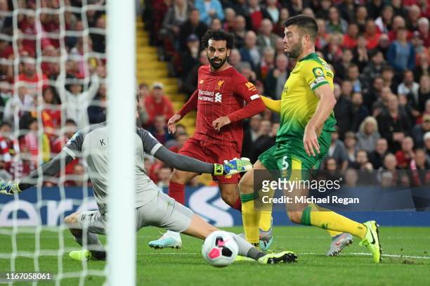 Mohamed Salah of Liverpool scores his sides second goal during the Premier League match between Liverpool FC and Norwich City at Anfield on August...