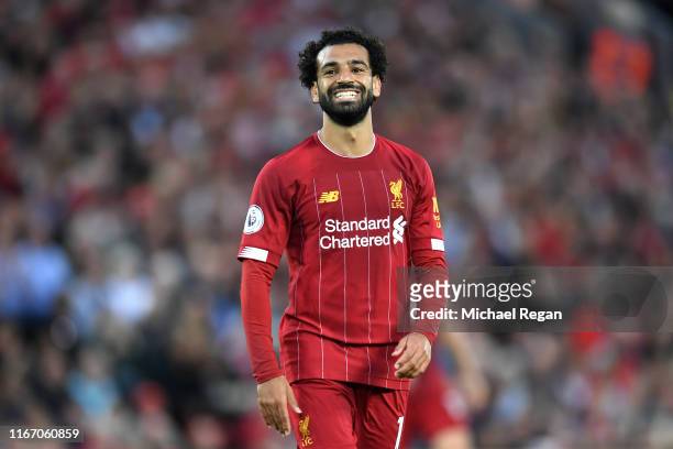 Mohamed Salah of Liverpool smiles during the Premier League match between Liverpool FC and Norwich City at Anfield on August 09, 2019 in Liverpool,...