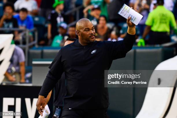 Assistant head coach/running backs coach Duce Staley of the Philadelphia Eagles walks on the field before a preseason game against the Tennessee...