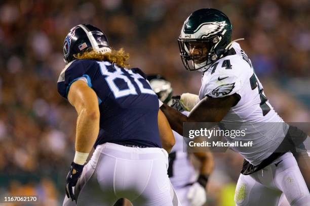 Daeshon Hall of the Philadelphia Eagles rushes the passer against Ryan Hewitt of the Tennessee Titans in the preseason game at Lincoln Financial...