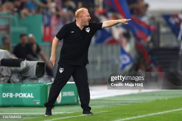 Heiko Vogel, Head Coach of KFC Uerdingen gives his team instructions during the DFB Cup first round match between KFC Uerdingen and Borussia Dortmund...