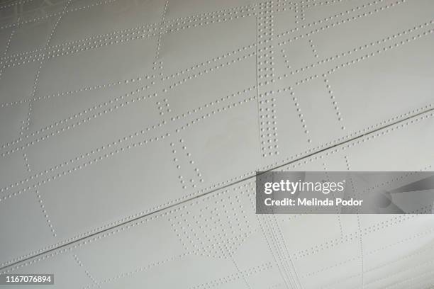 close up of airplane fuselage - aerospace abstract stock pictures, royalty-free photos & images