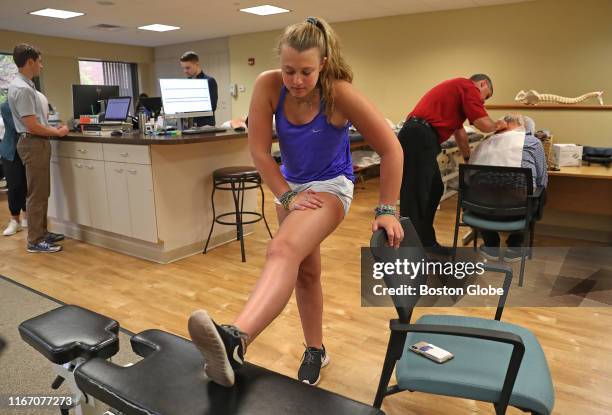 At Advance Sports Therapy in Wellesley, MA, Haley Lewis takes part in physical therapy, rehabbing a meniscus tear in her left knee on Aug. 23, 2019....