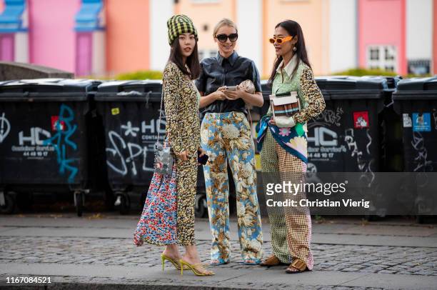 Guests seen wearing prints and pattern outside Ganni during Copenhagen Fashion Week Spring/Summer 2020 on August 08, 2019 in Copenhagen, Denmark.