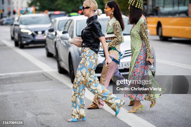 Guests seen wearing prints and pattern outside Ganni during Copenhagen Fashion Week Spring/Summer 2020 on August 08, 2019 in Copenhagen, Denmark.