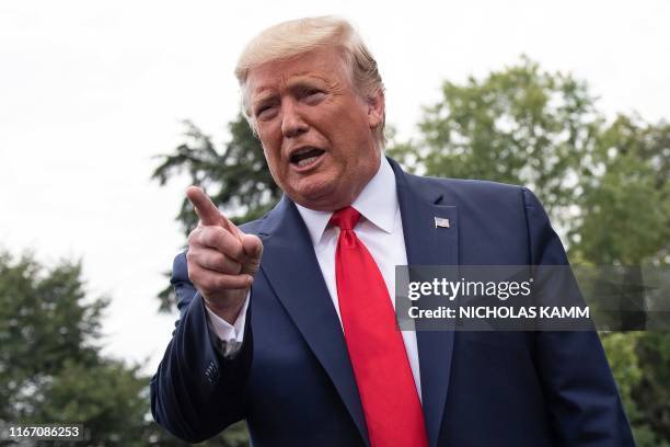 President Donald Trump speaks to the press on the South Lawn of the White House in Washington, DC, on September 9, 2019 before he departs for North...