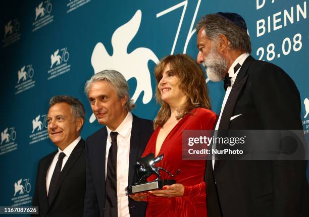 French actress Emmanuelle Seigner, flanked by Italian producer Paolo Del Brocco, French producer Alain Goldman and Italian producer Luca Barbareschi,...