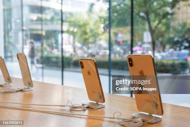 Phone XS and iPhone XS Max displayed in an Apple store in Shanghai.
