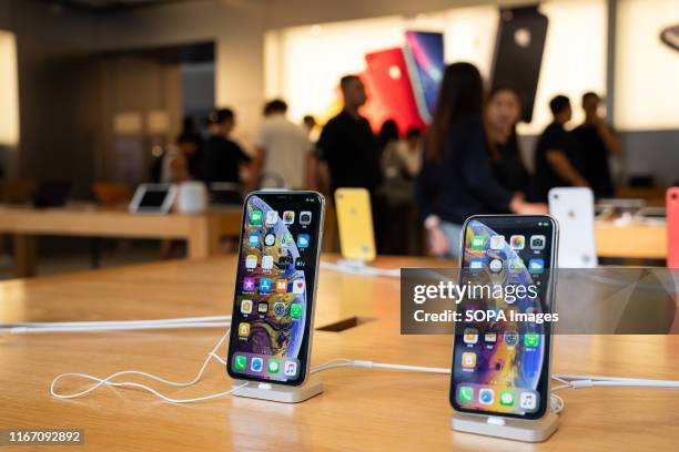 Phone XS and iPhone XS Max displayed in an Apple store in Shanghai.