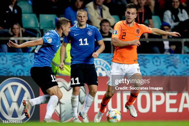 Ragnar Klavan of Estonia, Henrik Ojamaa of Estonia, Joel Veltman of Holland during the EURO Qualifier match between Estonia v Holland at the...