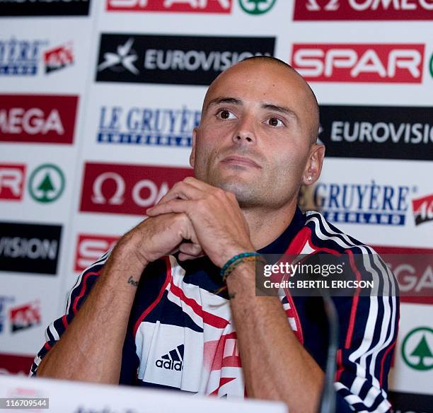 Great Britan's 110m hurdler Andy Turner attends a news conference on June 17 in Stockholm, Sweden in view of the upcoming European track and field...