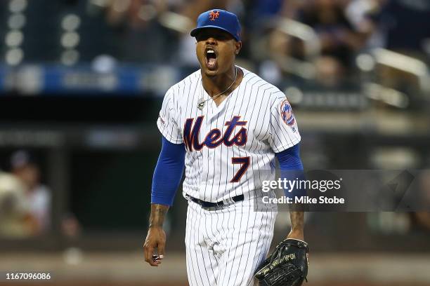 Marcus Stroman of the New York Mets reacts after striking out Trea Turner of the Washington Nationals to end the top of the third inning at Citi...