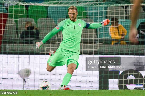 Slovenia's goalkeeper Jan Oblak shoots the ball during the UEFA Euro 2020 Group G qualifying football match between Slovenia and Israel at the...