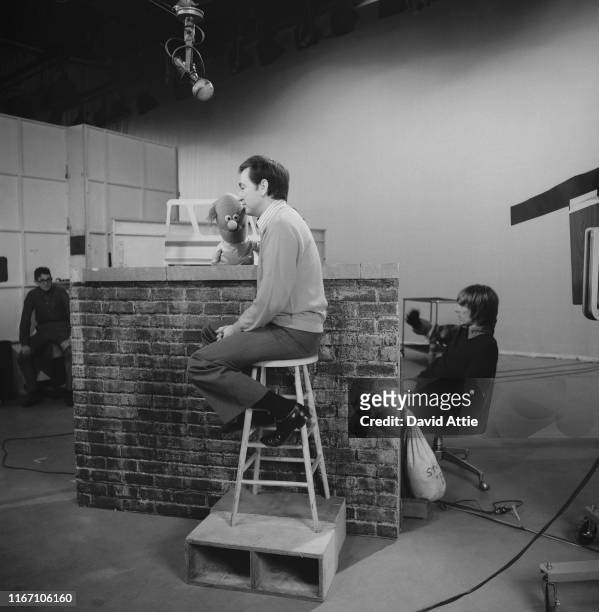 Actor and singer Bob McGrath with 'Anything Muppet' dentist, and puppeteer Daniel Seagren, during rehearsals for an episode of Sesame Street at...