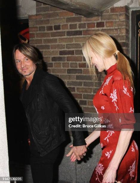 Keith Urban and Nicole Kidman are seen leaving "Moulin Rouge" on Broadway at The Hirshfeld Theatre on August 9, 2019 in New York City.