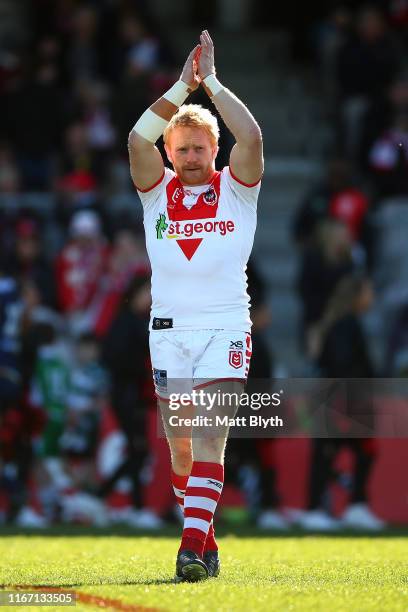 James Graham of the Dragons thanks the crowd as he walks onto the field to play in his 400th rugby league match during the round 21 NRL match between...