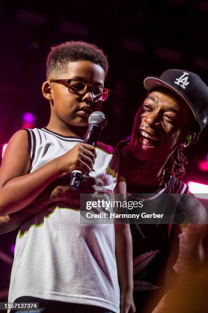 Wiz Khalifa and his son Sebastian Taylor Thomaz perform at FivePoint Amphitheatre on August 09, 2019 in Irvine, California.