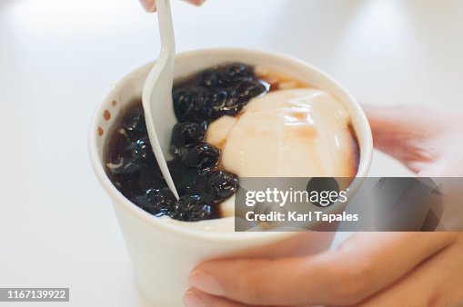 Taho or tapioca pudding on a disposable cup