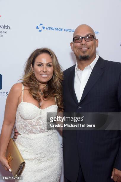 Rebecca Villalobos and former MLB great David Justice attend the 19th annual Harold and Carole Pump Foundation Gala at The Beverly Hilton Hotel on...