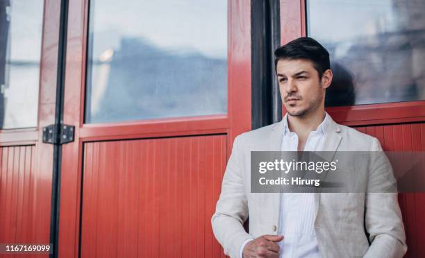 handsome businessman - white suit stock pictures, royalty-free photos & images