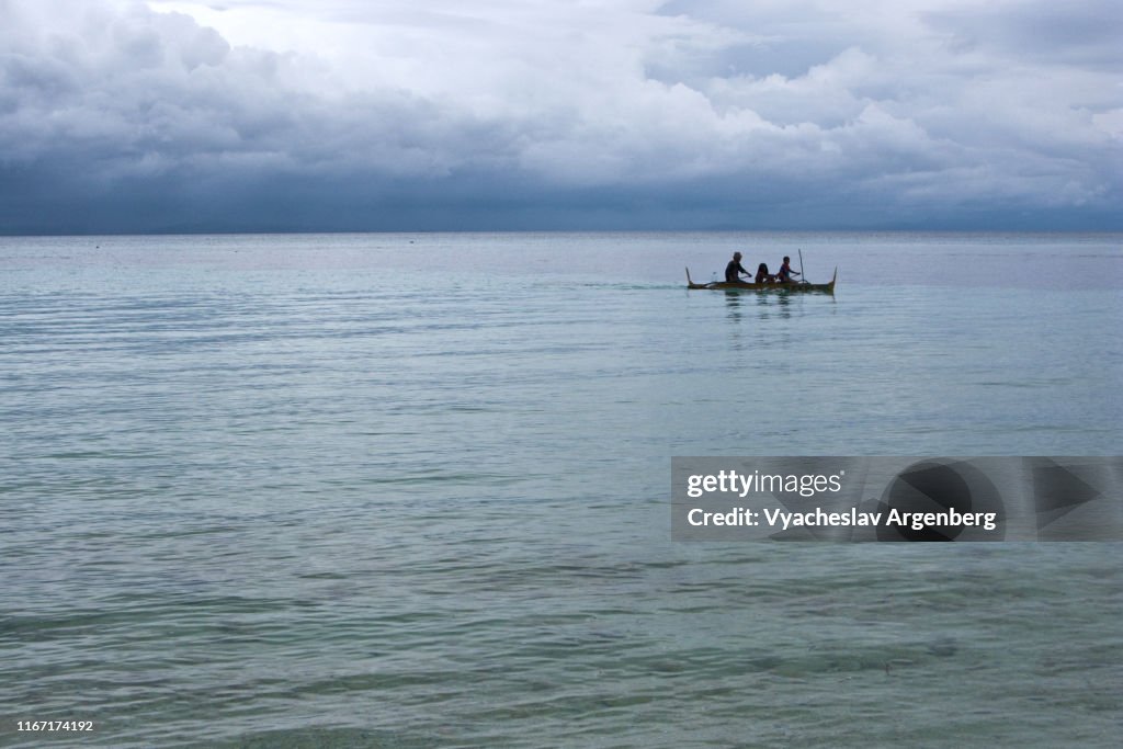 Blue waters of Visayan Sea under tropical clouds, Philippines