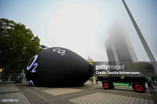 Greenpeace demonstrates against CO2 emissions of cars at an entrance to the IAA at the IAA Frankfurt Motor Show on September 10, 2019 in Frankfurt am...