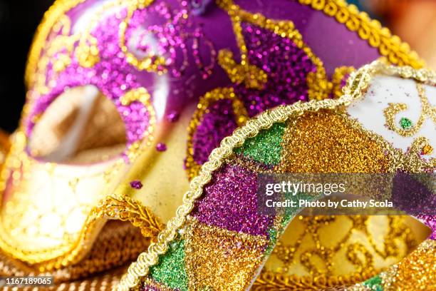 mardi gras masks - mardi gras stock-fotos und bilder