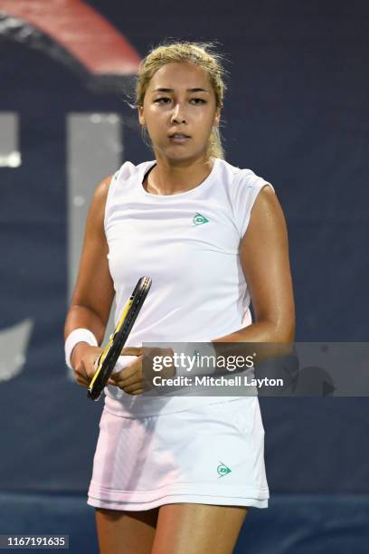 Zarina Diyas of Kazakhstan serves to Camilla Giorgi of France during Day 5 of the Citi Open at Rock Creek Tennis Center on August 2, 2019 in...