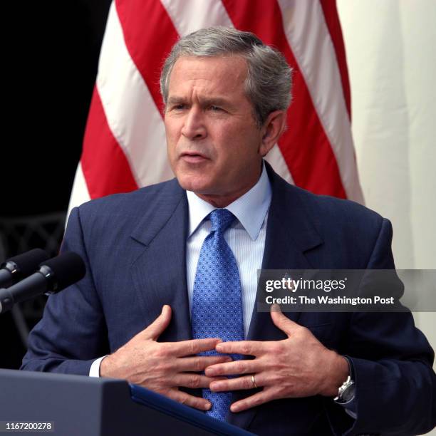 President George W. Bush answers questions during a morning news conference in the Rose Garden.