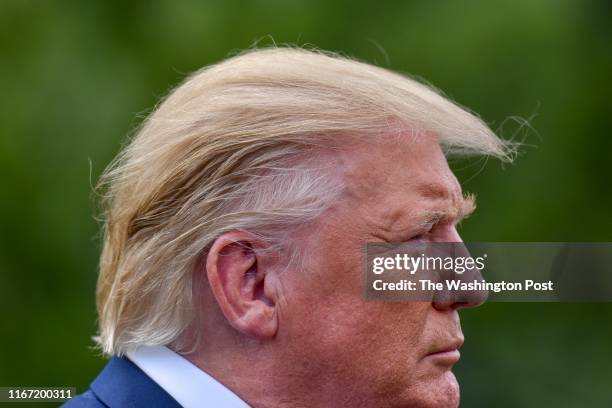 Donald Trump addresses the media as he departs the White House en route to Joint Base Andrews, from where he will head to a political rally in North...