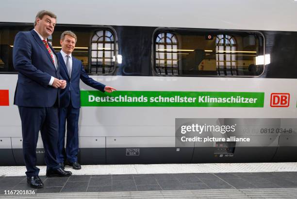 September 2019, Berlin: Enak Ferlemann , Parliamentary State Secretary for Transport and Digital Infrastructure, and Richard Lutz, Chairman of the...