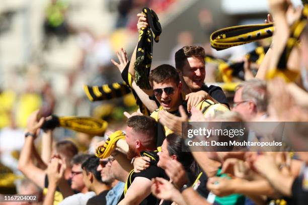 Alemannia Aachen fans show their support during the DFB Cup first round match between Alemannia Aachen and Bayer 04 Leverkusen at Tivoli Stadium on...