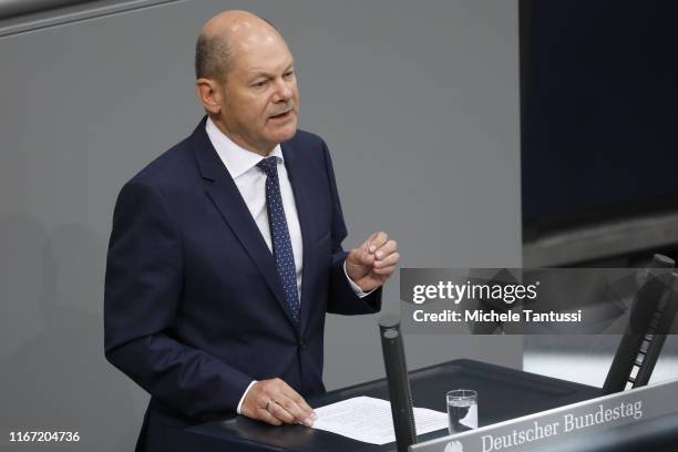 Finance Minister and vice Chancellor, Olaf Scholz speaks during the first session after summer Vacation of the German Parliament,or Bundestag, which...