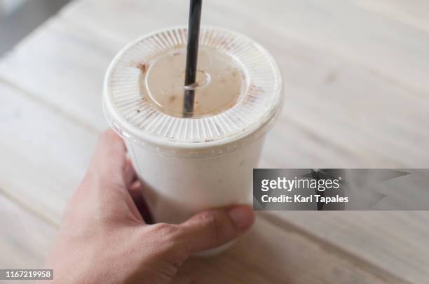 a single-use white plastic cup with drinking straw - straw stock pictures, royalty-free photos & images