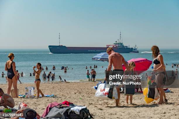 Daily life with people enjoying the summer sun at Vlissingen beach in Zeeland, The Netherlands on 25 August 2019. The 4-kilometer long beach has...