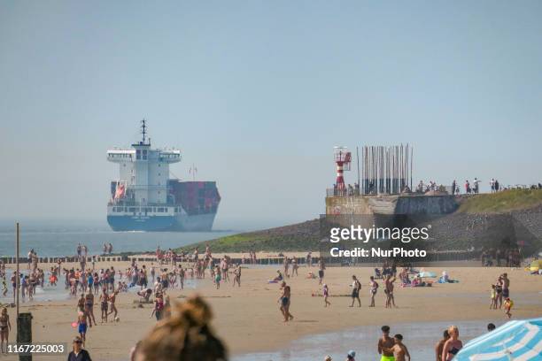 Daily life with people enjoying the summer sun at Vlissingen beach in Zeeland, The Netherlands on 25 August 2019. The 4-kilometer long beach has...