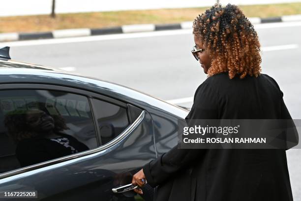Bona Mugabe, daughter of late former Zimbabwe president Robert Mugabe, leaves the Singapore Casket building in Singapore on September 10 where the...