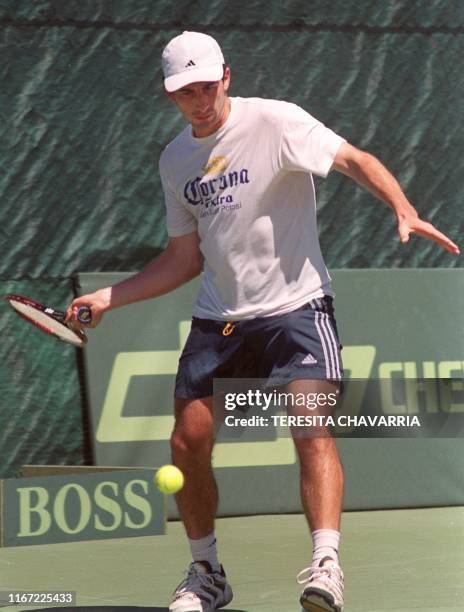 Mexico's Alejandro Hernandez watches the ball 02 February 2000 at the Costa Rica Country Club in San Jose, Costa Rica as he prepares for the Davis...