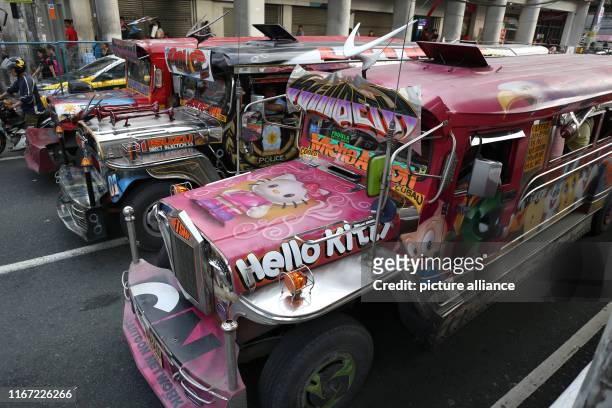 July 2019, Philippines, Manila: A jeepney drives through the capital of the Philippines. Jeepneys are originally converted military jeeps that were...