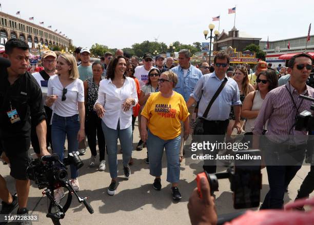 Democratic presidential candidate U.S. Sen. Kamala Harris walks with former Iowa Democratic Party Chair Sue Dvorsky while attending the Iowa State...