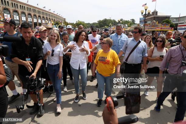 Democratic presidential candidate U.S. Sen. Kamala Harris walks with former Iowa Democratic Party Chair Sue Dvorsky while attending the Iowa State...