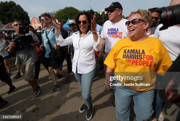 Democratic presidential candidate U.S. Sen. Kamala Harris walks with former Iowa Democratic Party Chair Sue Dvorsky while attending the Iowa State...