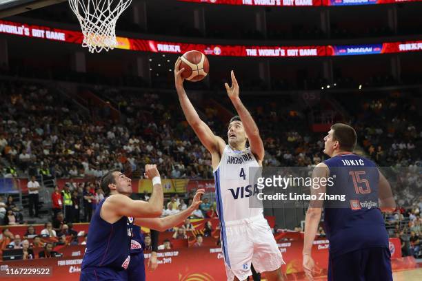Luis Scola of Argentina drives to basket against Nemanja Bjelica of Serbia during FIBA World Cup 2019 Quarter-finals match between Argentina and...