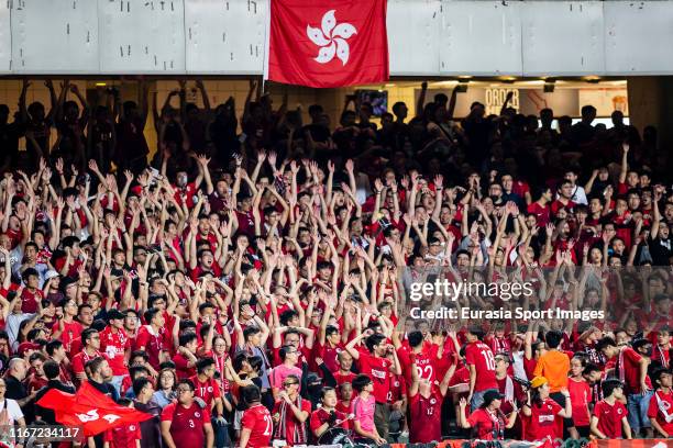 Fans of Hong Kong cheer during the FIFA World Cup Asian Qualifier 2nd Round match between Hong Kong and IR Iran at Hong Kong Stadium on September 10,...